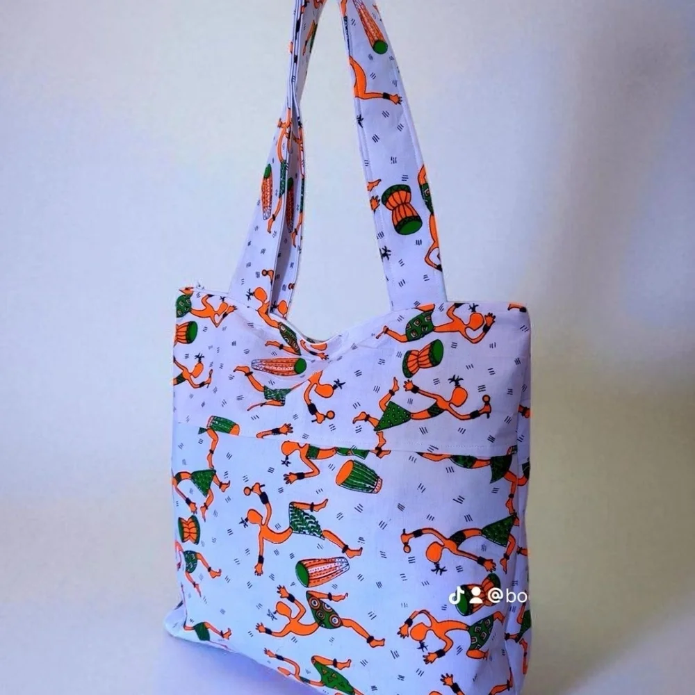 Vibrant Purple Tote Bag with Artistic Design
